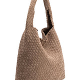 Beige woven handbag on a white background