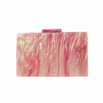 marbled pink clutch against a white background