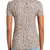 A woman viewed from the back wearing a short-sleeve crewneck t-shirt with a beige and gray leopard print, paired with light blue jeans, against a plain white background.