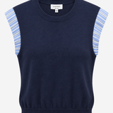 A navy blue sleeveless knit top with light blue and white striped shoulder panels, shown against a plain light gray background.