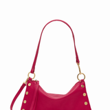 Pink handbag with gold accents on a white background