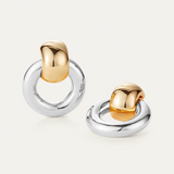 Statement gold knocker earrings with sculptural design