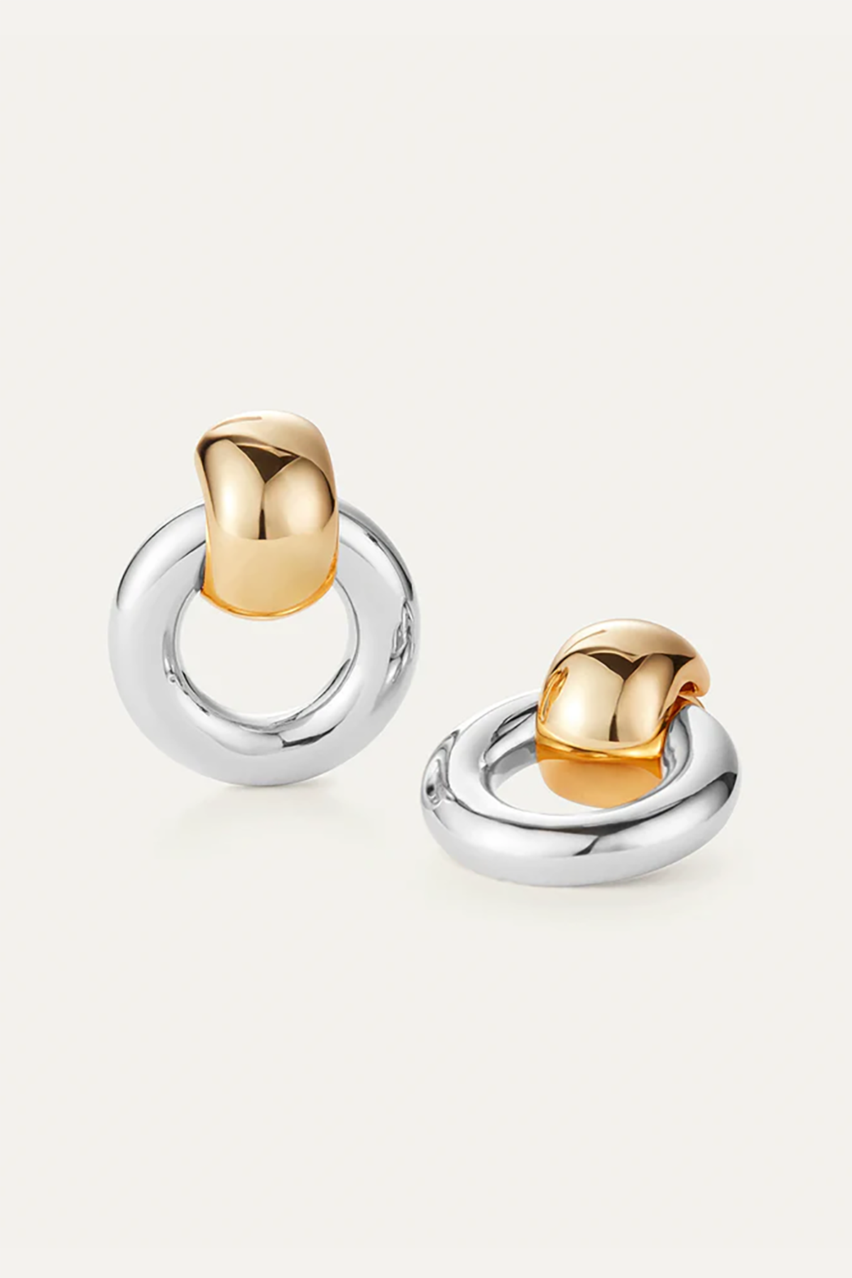 Statement gold knocker earrings with sculptural design