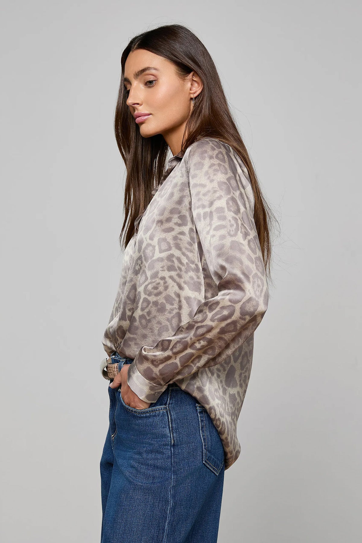 Long-sleeve blouse with a smooth, polished finish.