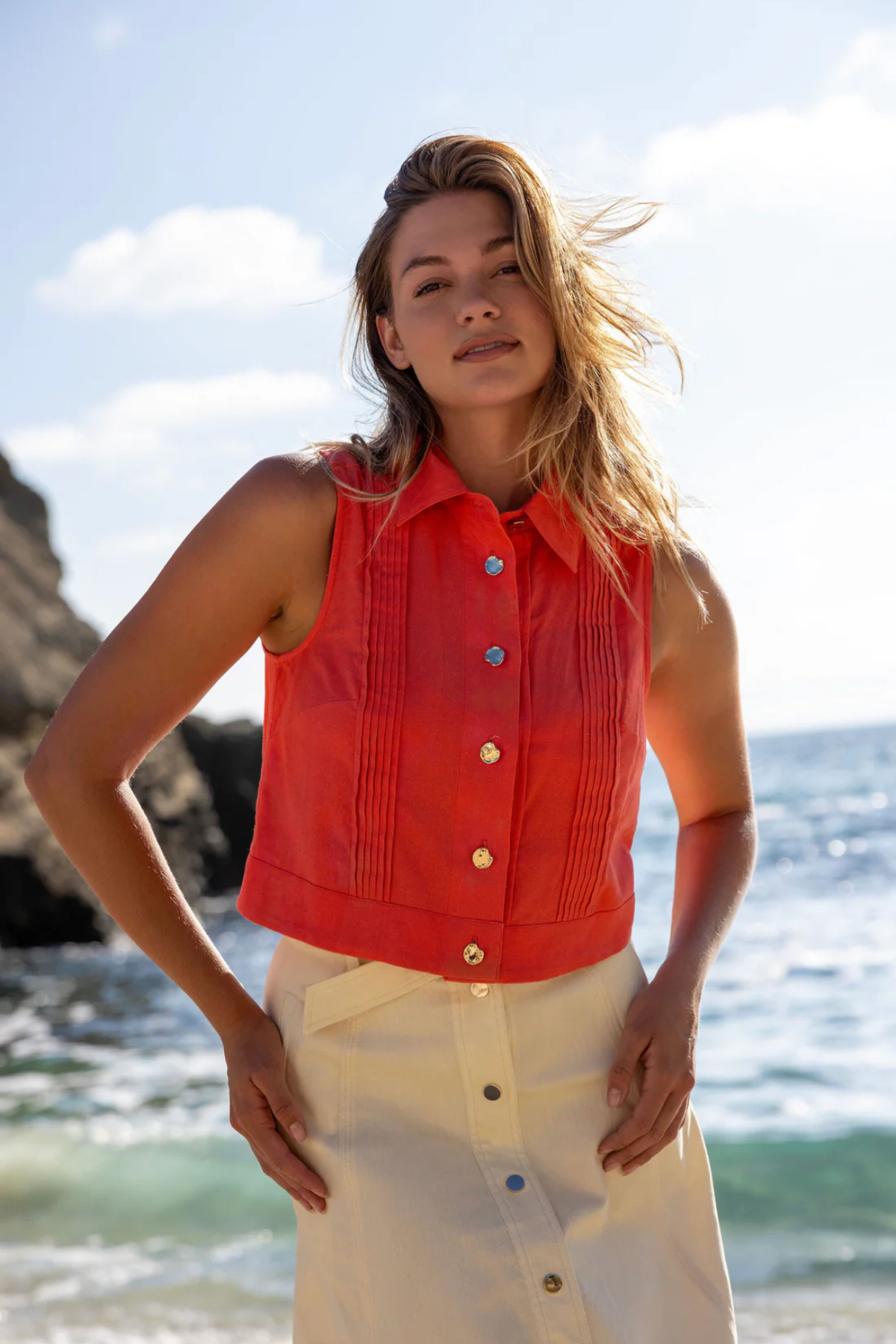 woman outside in red top 