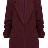 A dark burgundy blazer with notched lapels and front flap pockets, shown on a plain white background.