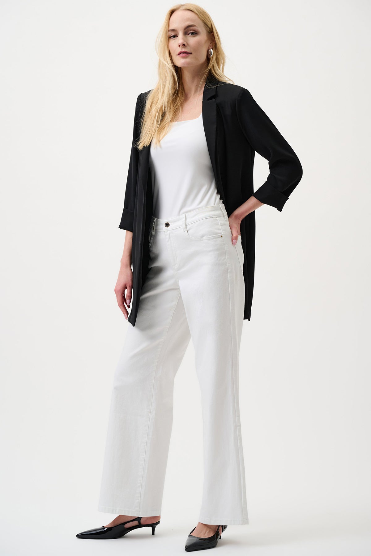 White wide-leg stretch denim jeans with high-rise fit.