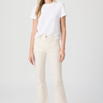 Woman wearing a white t-shirt and beige pants on a white background