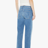 Person wearing blue jeans and a white top on a white background