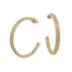 Gold hoop earrings on a white background