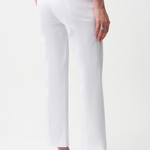 White pants worn by a person on a white background