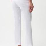 White pants worn by a person on a white background