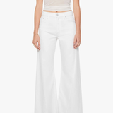 woman in monochromatic outfit on white background 