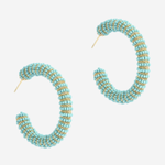 A pair of open hoop earrings made of small turquoise-blue and gold seed beads, displayed on a clean, light gray background.
