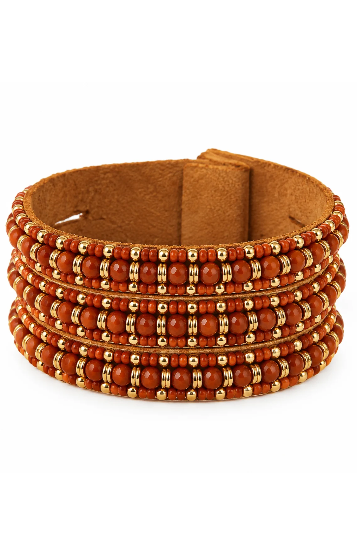 A wide brown suede cuff bracelet decorated with multiple rows of orange-red beads and small gold spacer rings, shown on a plain white background.