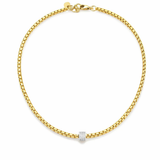 A gold chain necklace with a small rectangular pavé diamond center stone, displayed on a clean white background.