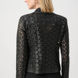 Black perforated leather jacket worn by a person on a white background
