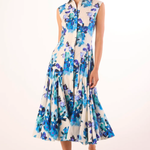 Woman wearing a floral dress with a white background