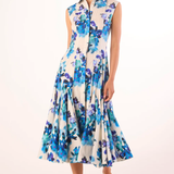 Woman wearing a floral dress with a white background