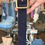 Navy belt with gold buckle