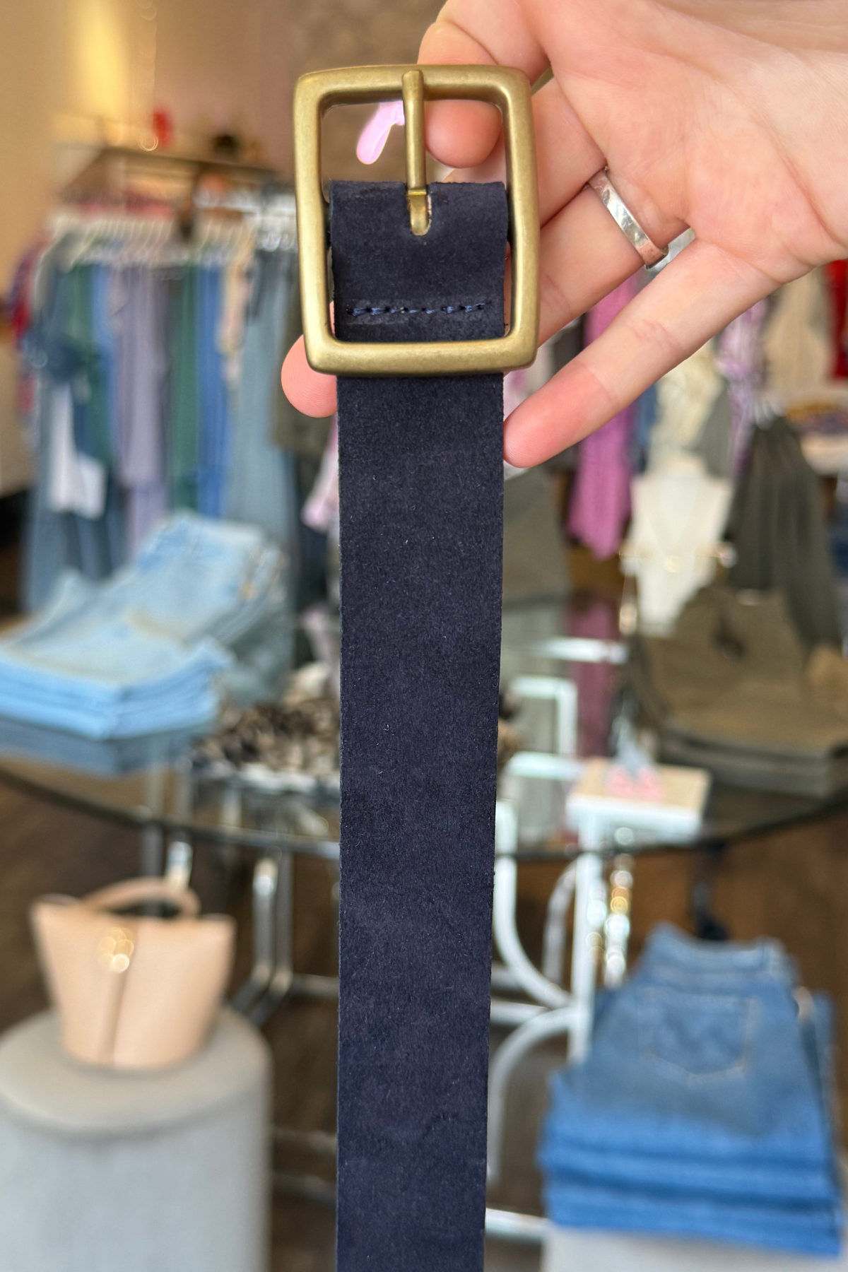 Navy belt with gold buckle