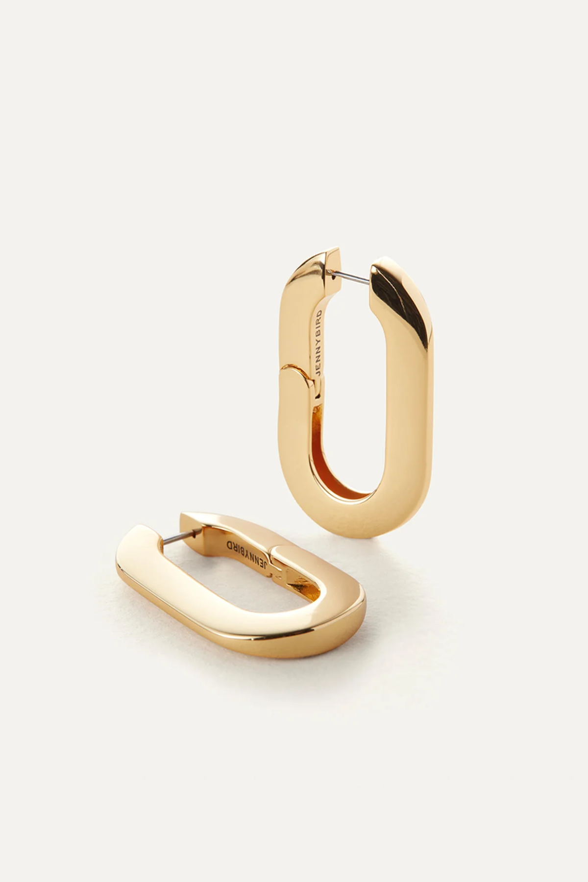 Gold hoop earrings on a white background
