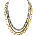 Two layered chain necklaces, one gold and one silver, on a white background.
