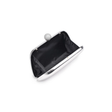 silver handbag open on white background