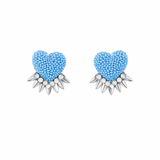 Blue heart-shaped earrings with silver spikes on a white background