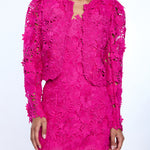 Pink lace dress on a white background