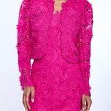 Pink lace dress on a white background