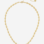 A gold beaded necklace with a delicate chain extender and a small round tag, displayed on a clean white background.