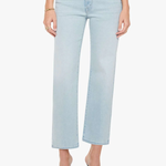 Light blue jeans worn by a person on a white background