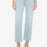 Light blue jeans worn by a person on a white background