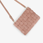 A woven rectangular crossbody bag in a dusty rose pink color, featuring a matching shoulder strap and small gold-tone hardware, shown against a plain light gray background.