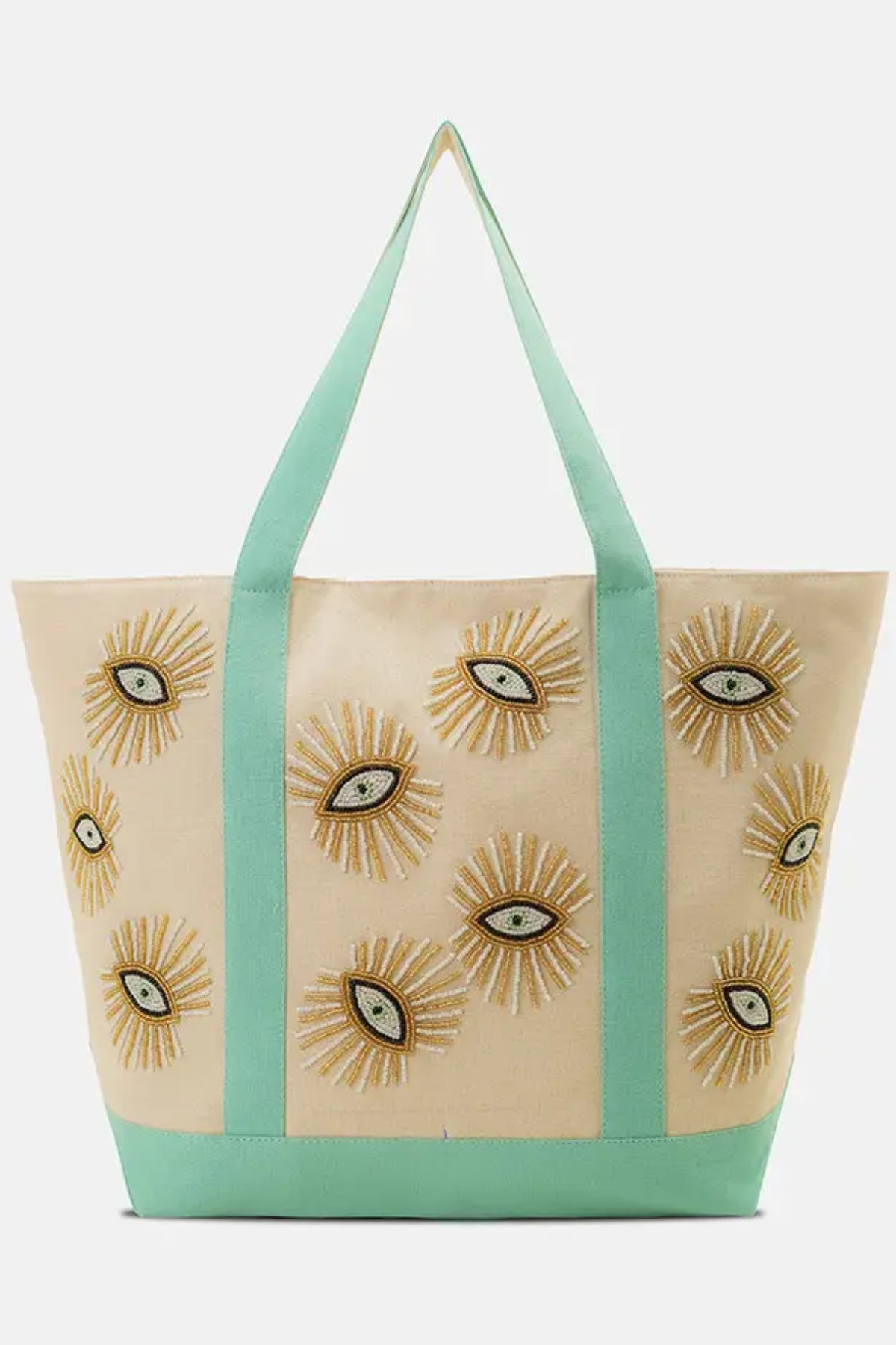 Beige tote bag with sunflower designs and green straps on a white background