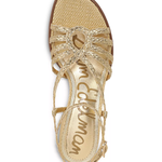 top view braided gold heeled sandal on white background 