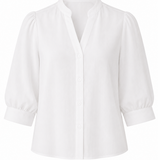 White blouse with rolled-up sleeves on a white background