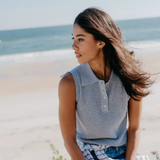 woman on beach in grey tank top 