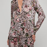 Leopard print pajama set with floral patterns on a gray background