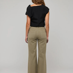 Women's neutral wardrobe style featuring a relaxed, polished silhouette.