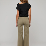 Women's neutral wardrobe style featuring a relaxed, polished silhouette.