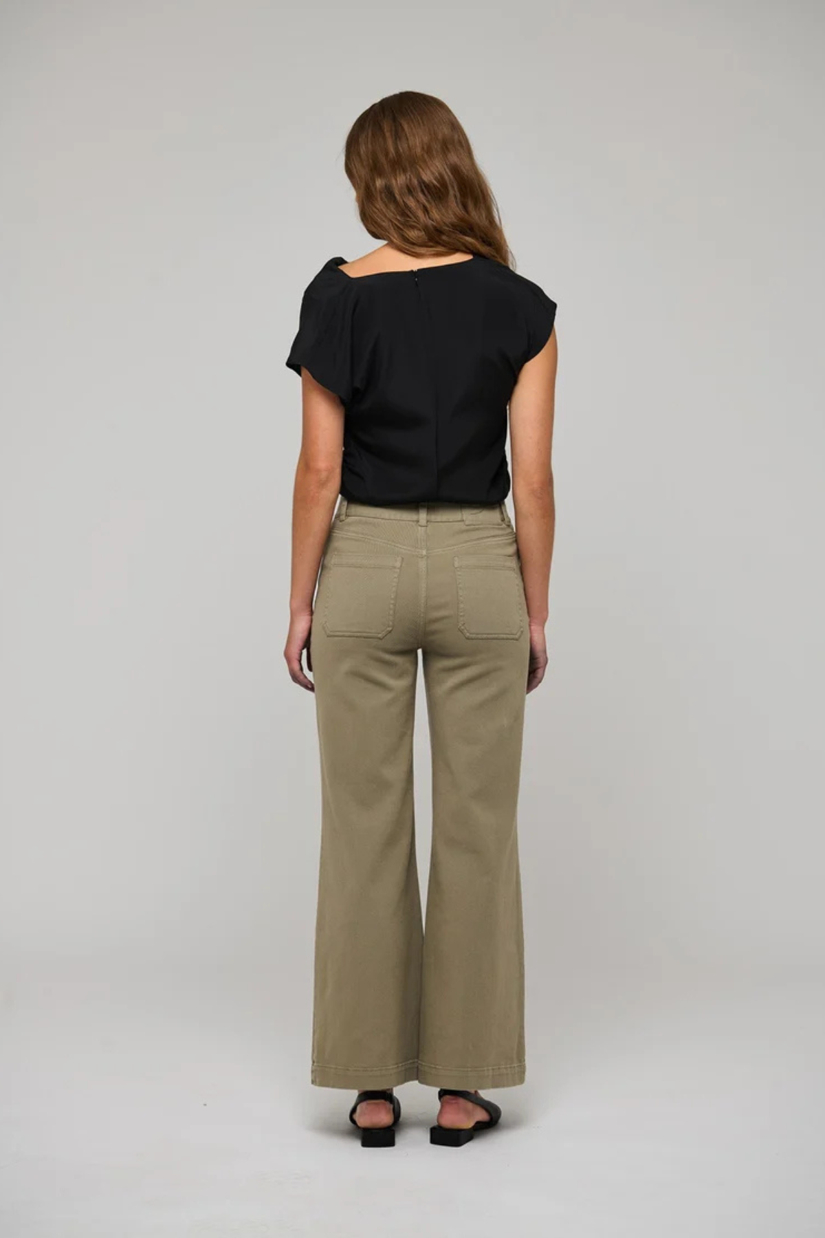 Women's neutral wardrobe style featuring a relaxed, polished silhouette.