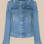 Blue denim jacket on a beige background