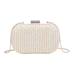 White woven clutch bag with pearl embellishments on a white background