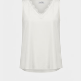 White sleeveless top on a light gray background
