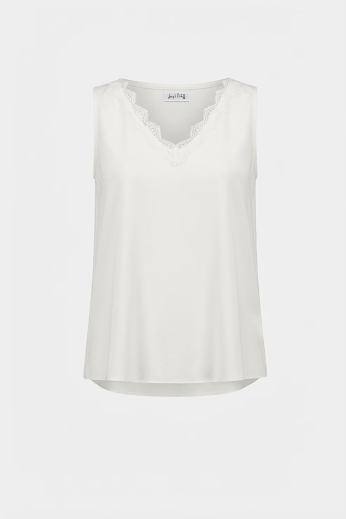 White sleeveless top on a light gray background