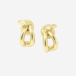 A pair of polished yellow gold huggie hoop earrings with a knotted, openwork design, displayed on a clean, light gray background.
