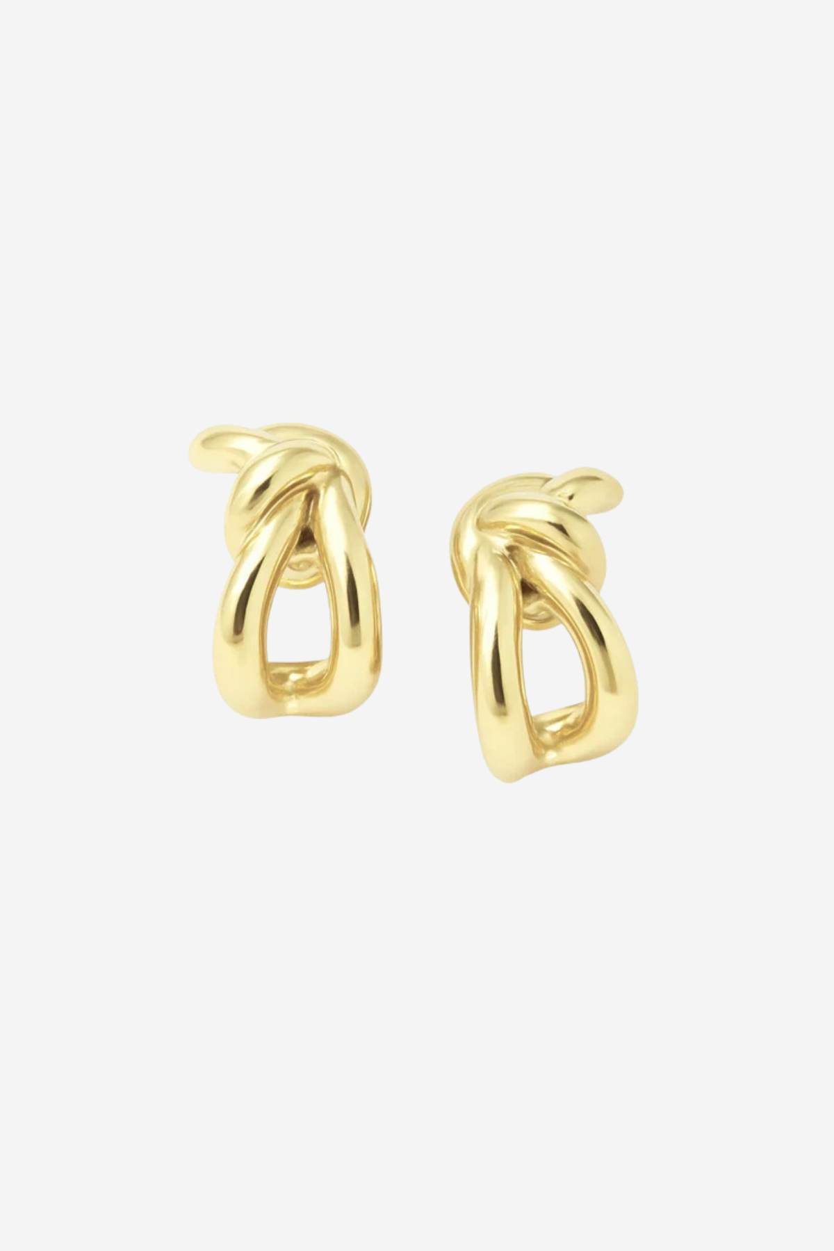 A pair of polished yellow gold huggie hoop earrings with a knotted, openwork design, displayed on a clean, light gray background.