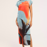 Model wearing a colorful printed sleeveless midi dress.